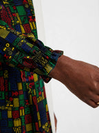 "Michoro" Long Sleeve Maxi Dress — close-up of the gathered ruffle cuff at the wrist