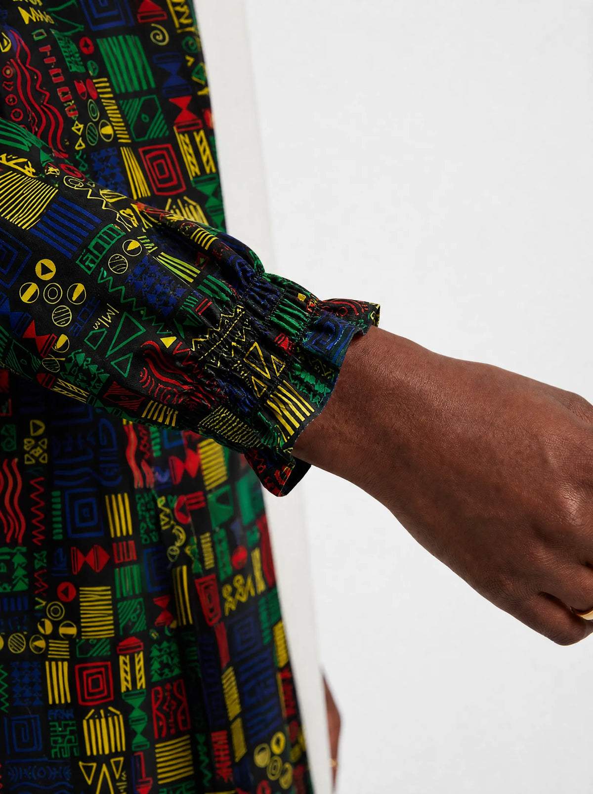 "Michoro" Long Sleeve Maxi Dress — close-up of the gathered ruffle cuff at the wrist