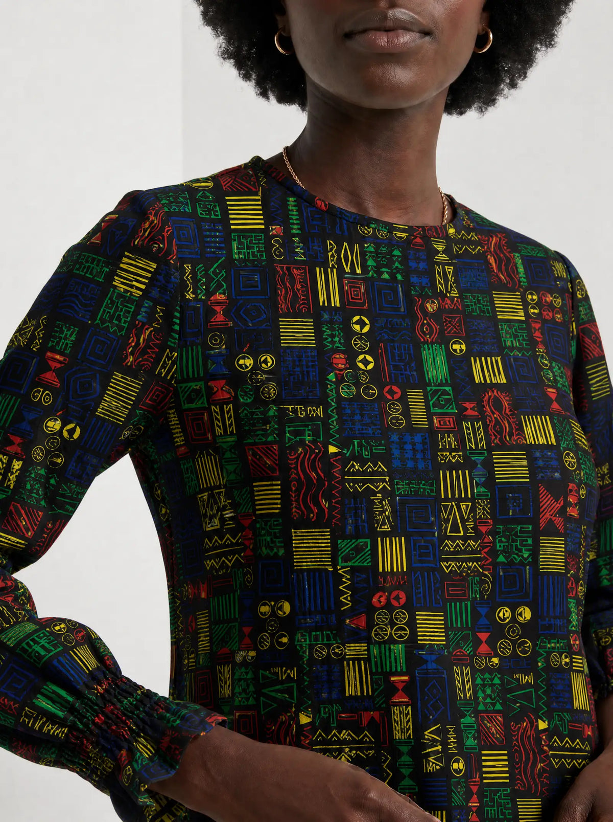 "Michoro" Long Sleeve Maxi Dress — close-up of the high round neckline