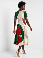 "Mikondo" Sweetheart Midi Dress — back view on model