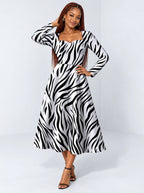 "Milia" Long Sleeve Sweetheart Midi Dress — front view on model