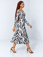 "Milia" Long Sleeve Sweetheart Midi Dress — side view on model