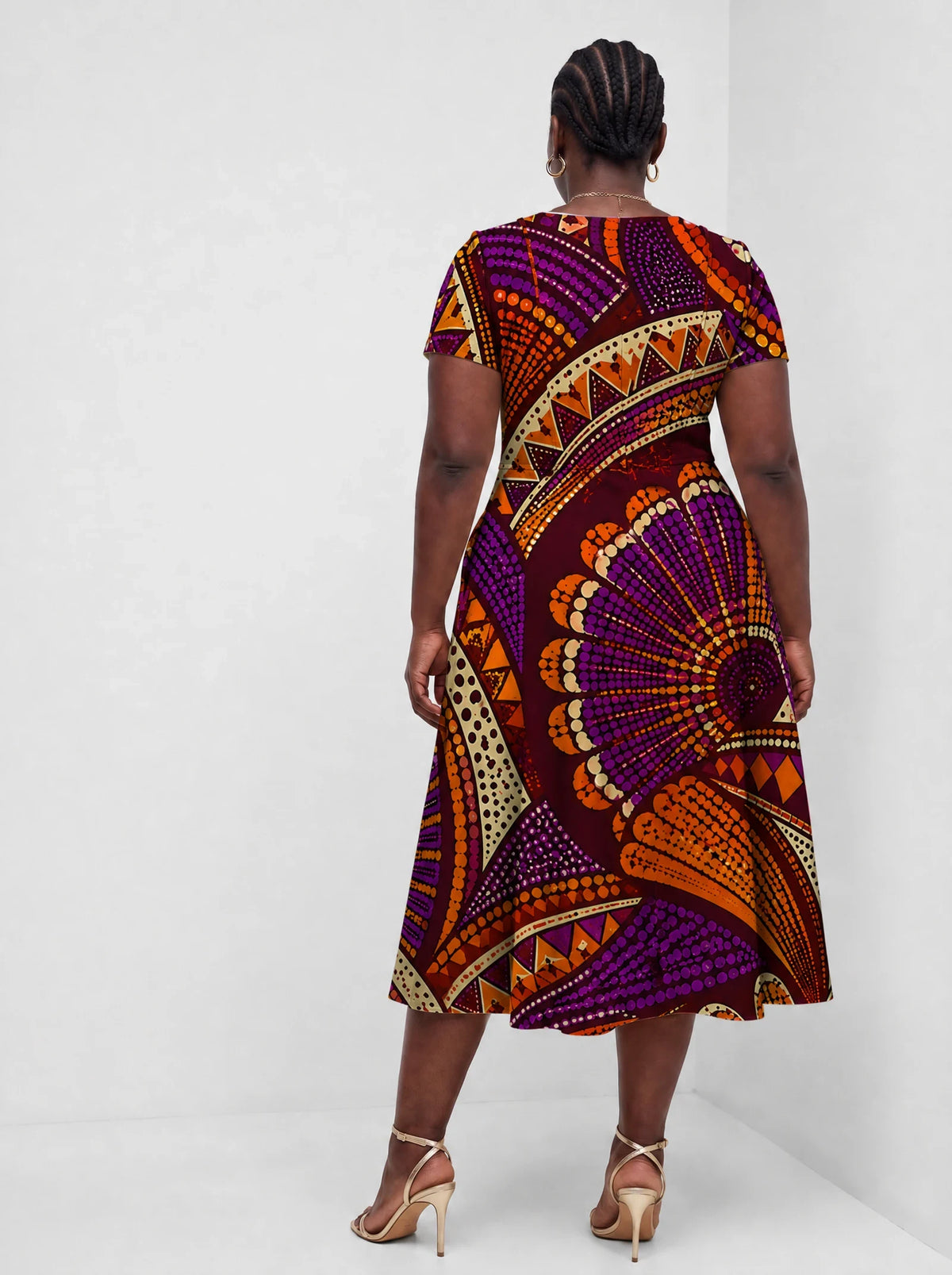 "Mionzi" Sweetheart Midi Dress — back view on model