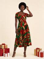 "Mitende" Sweetheart Midi Dress — on model, Christmas backdrop