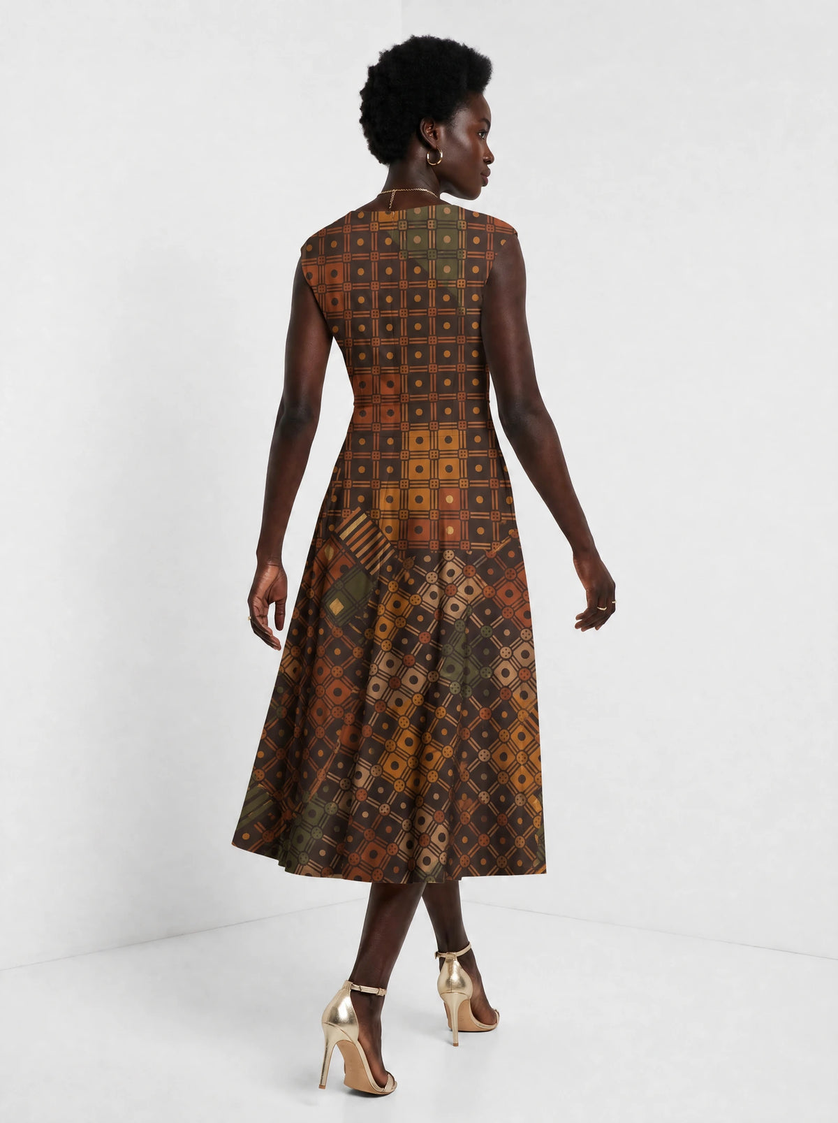 "Mkeka" Corset Dress — back view on model