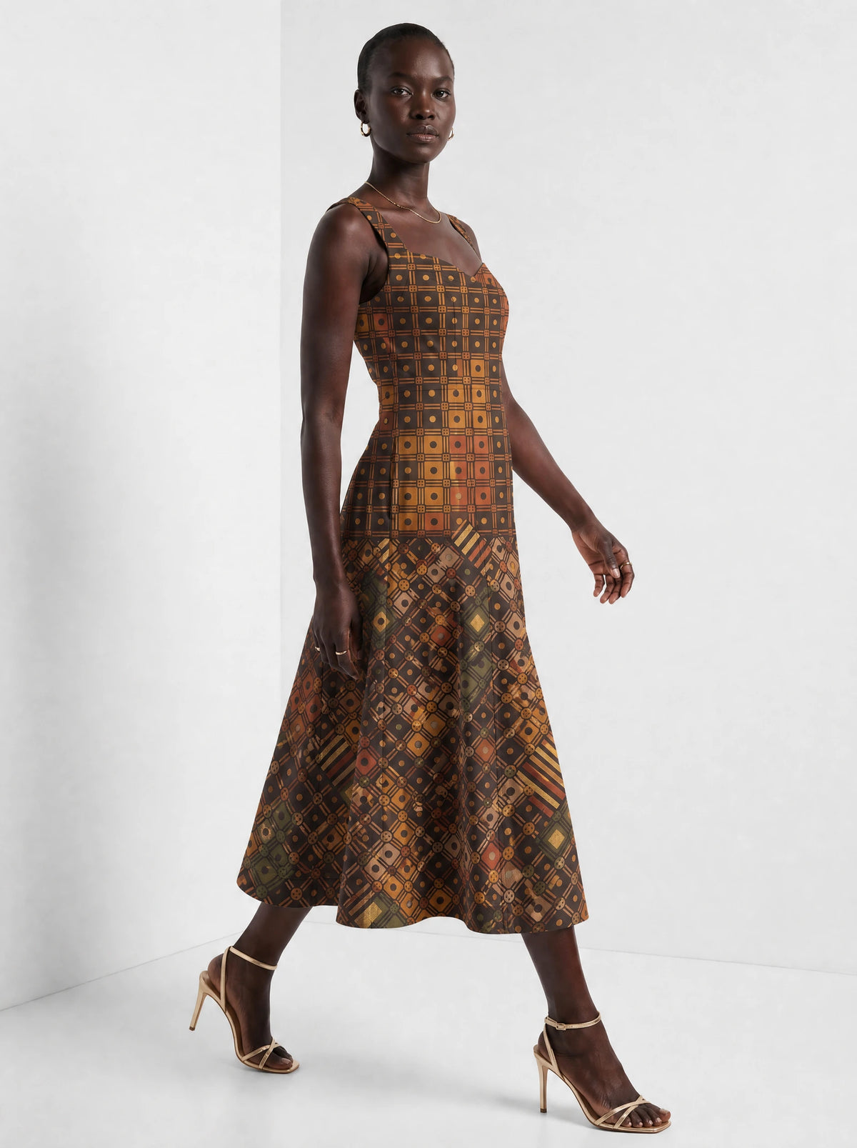 "Mkeka" Corset Dress — three-quarter view on model