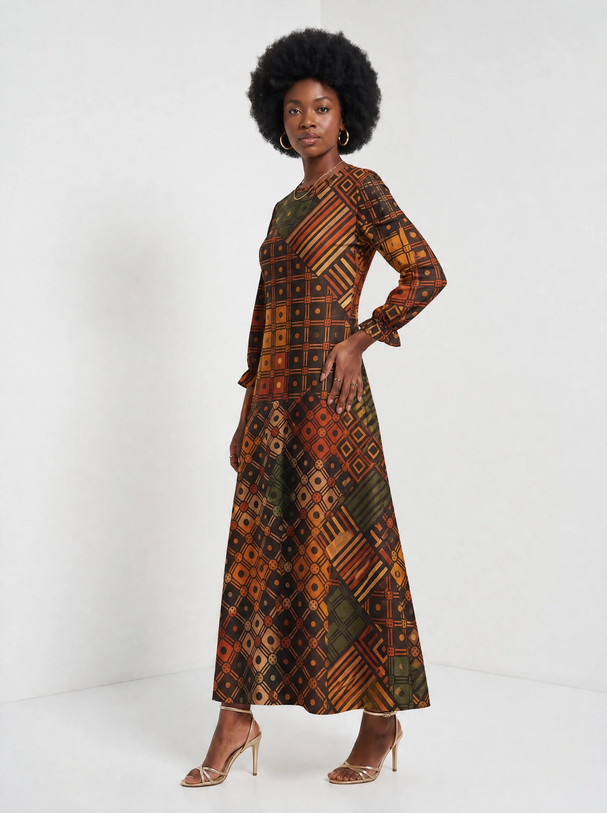 "Mkeka" Long Sleeve Maxi Dress — three-quarter view on model