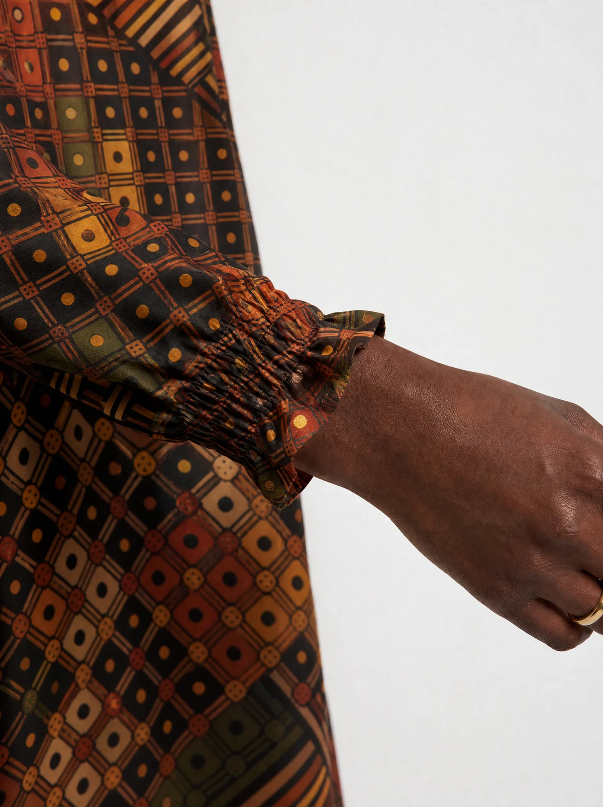 "Mkeka" Long Sleeve Maxi Dress — close-up of the gathered ruffle cuff at the wrist