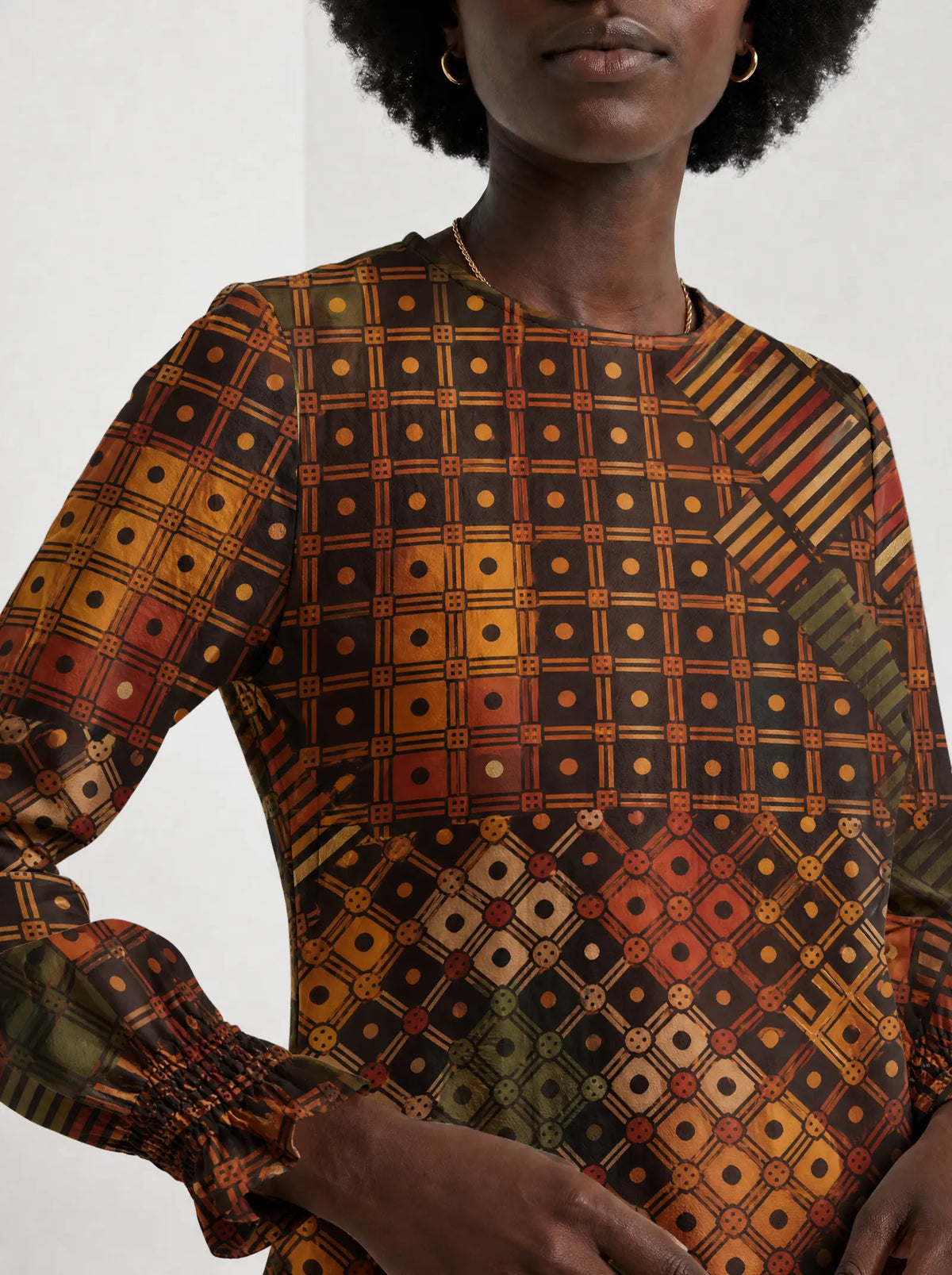 "Mkeka" Long Sleeve Maxi Dress — close-up of the high round neckline