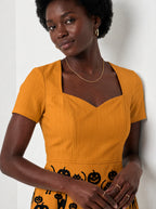 "Mkesha" Halloween Sweetheart Midi Dress — close-up of the sweetheart neckline and short sleeve