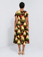 "Mshumaa" Sweetheart Midi Dress — back view on model