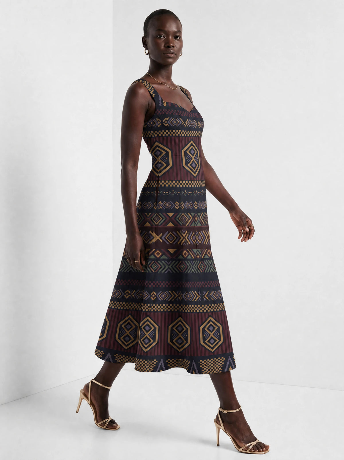 "Msuko" Corset Dress — three-quarter view on model