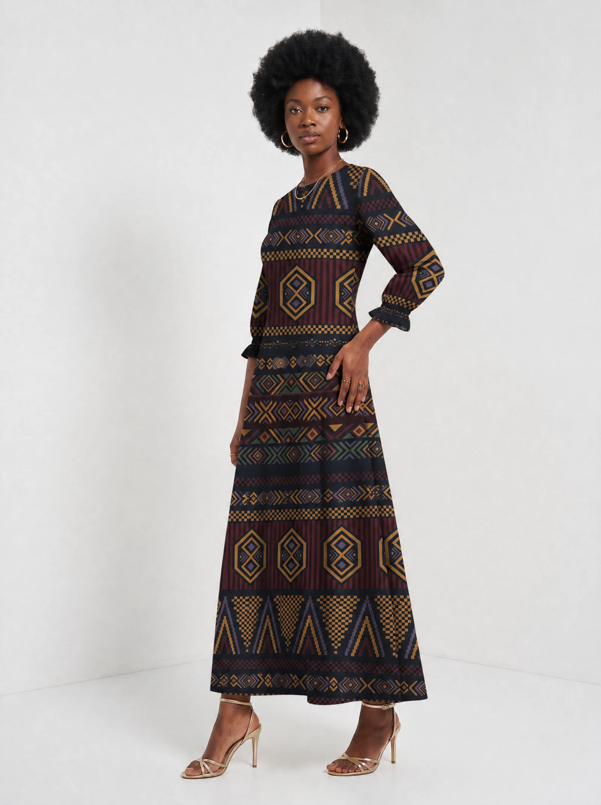 "Msuko" Long Sleeve Maxi Dress — three-quarter view on model