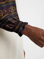 "Msuko" Long Sleeve Maxi Dress — close-up of the gathered ruffle cuff at the wrist