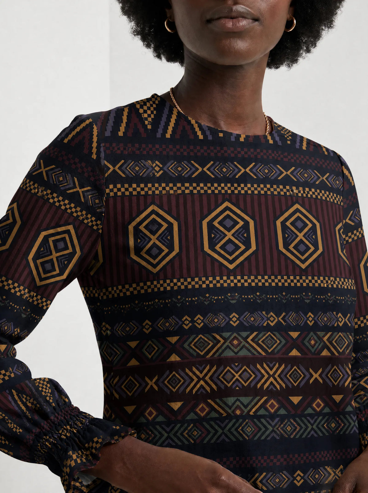 "Msuko" Long Sleeve Maxi Dress — close-up of the high round neckline