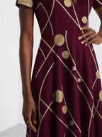 "Mvinyo" Short Sleeve Maxi Dress — standing, angled view on model