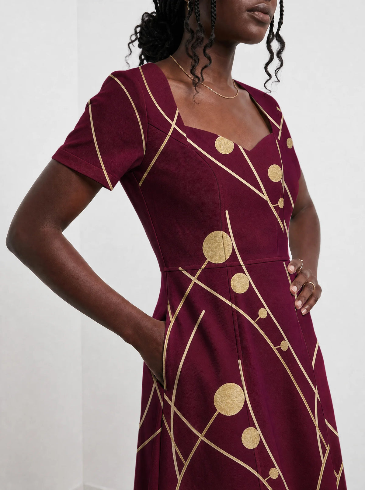 "Mvinyo" Sweetheart Midi Dress — standing, angled view on model