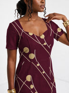 "Mvinyo" Sweetheart Midi Dress — three-quarter view on model
