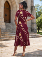 "Mvinyo" Sweetheart Midi Dress — back view on model in the churchyard