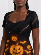 "Mwako" Halloween Sweetheart Midi Dress — close-up of the sweetheart neckline and short sleeve