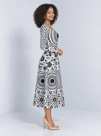 "Mwanga" Long Sleeve Sweetheart Midi Dress — side view on model