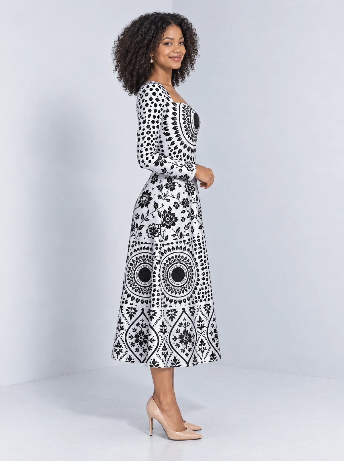 "Mwanga" Long Sleeve Sweetheart Midi Dress — side view on model