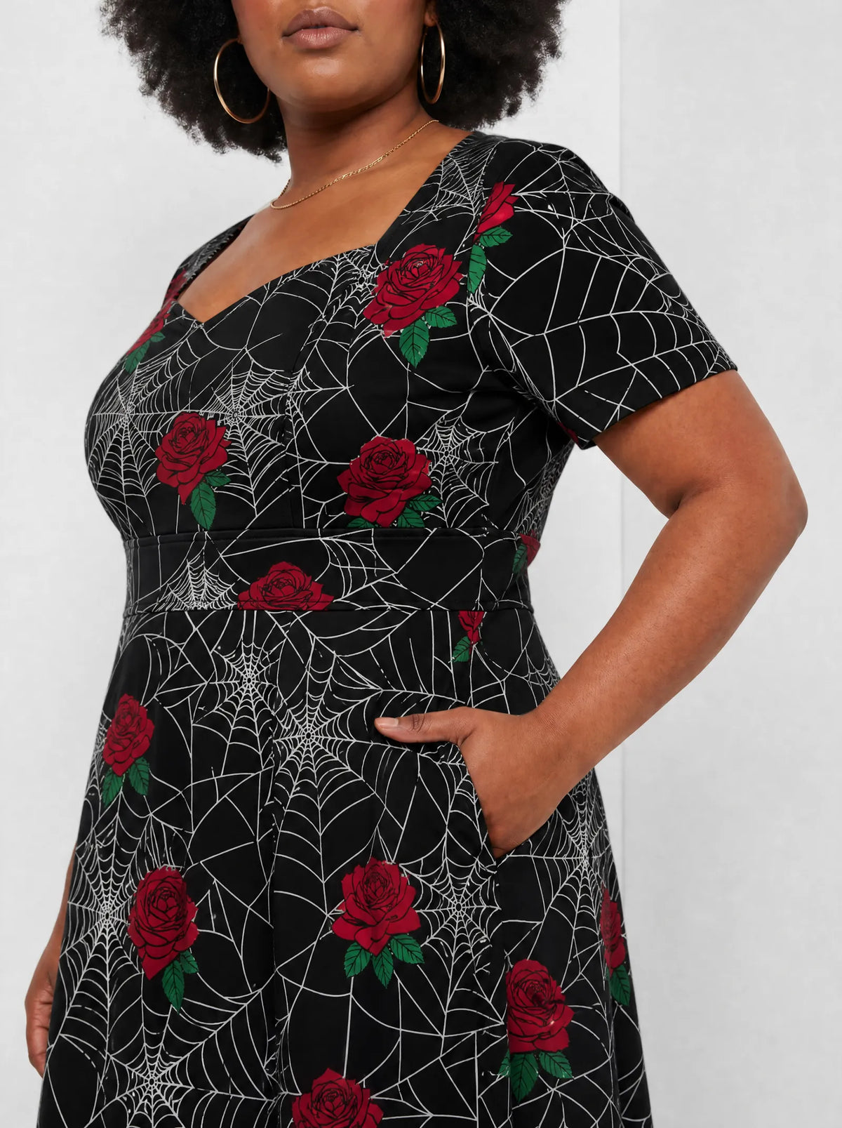 "Mwiba" Halloween Sweetheart Midi Dress — close-up of the bodice and the in-seam side pocket