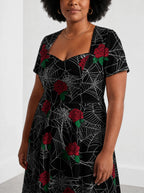 "Mwiba" Halloween Sweetheart Midi Dress — close-up of the sweetheart neckline and short sleeve