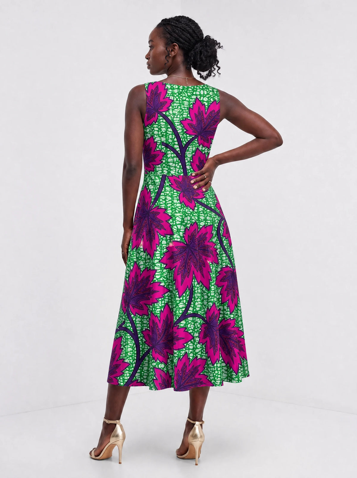 "Mzabibu" Corset Dress — back view on model