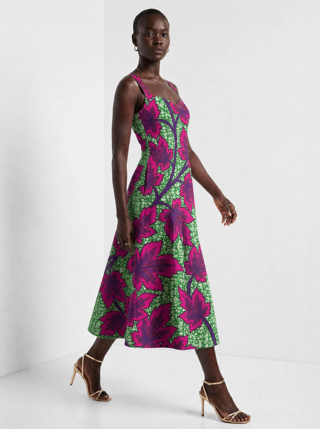 "Mzabibu" Corset Dress — three-quarter view on model