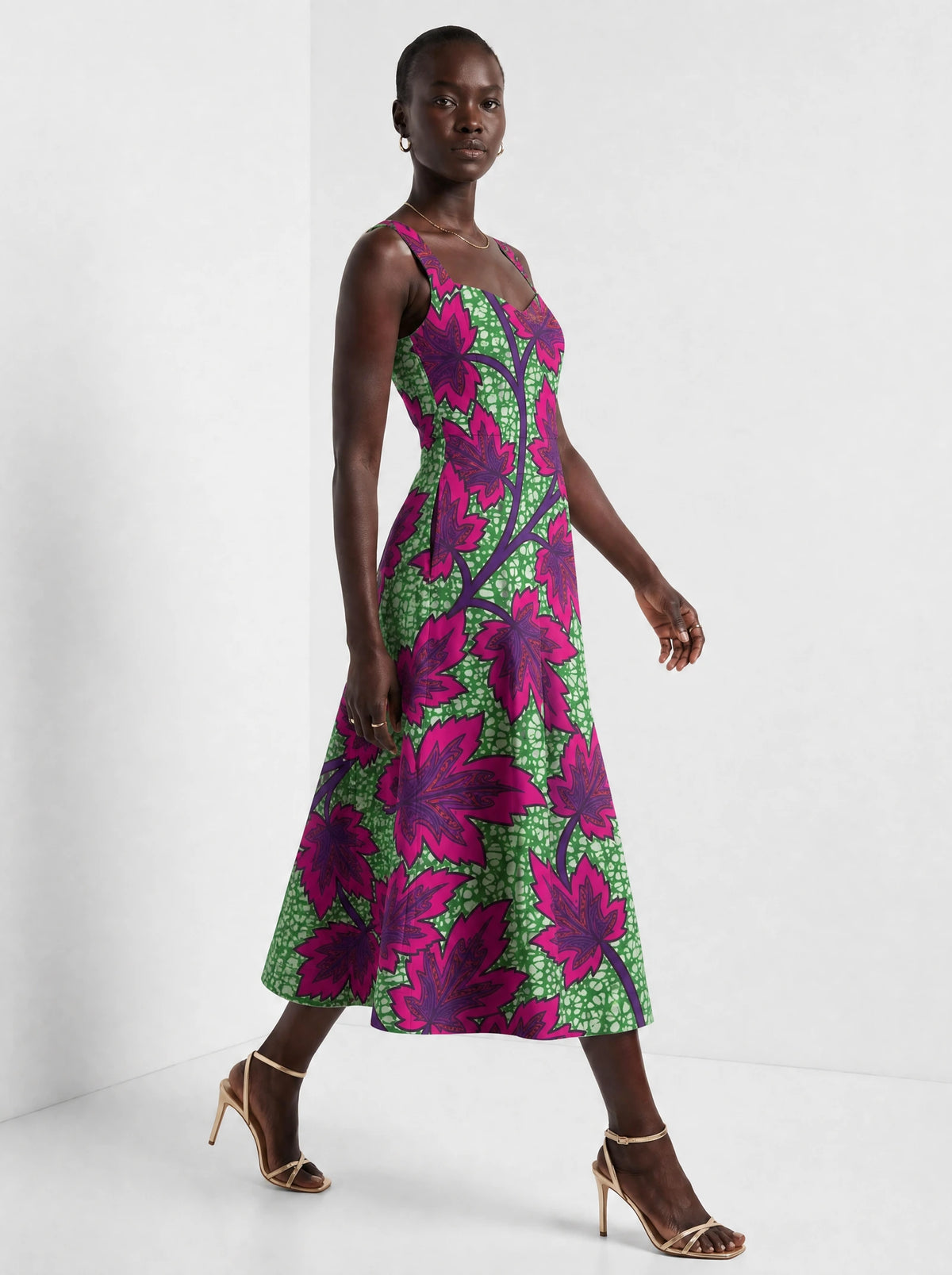 "Mzabibu" Corset Dress — three-quarter view on model