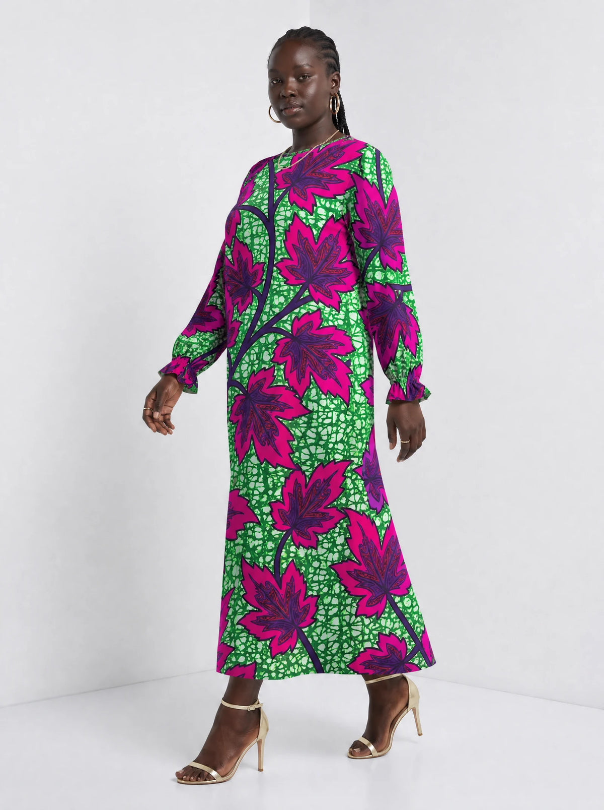 "Mzabibu" Long Sleeve Maxi Dress — three-quarter view on model