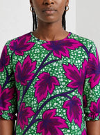"Mzabibu" Long Sleeve Maxi Dress — close-up of the high round neckline