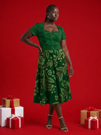 "Mzeituni" Sweetheart Midi Dress — on model, Christmas backdrop