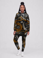 "Mzunguko" Hoodie Dress — front view on model, styled with the matching leggings