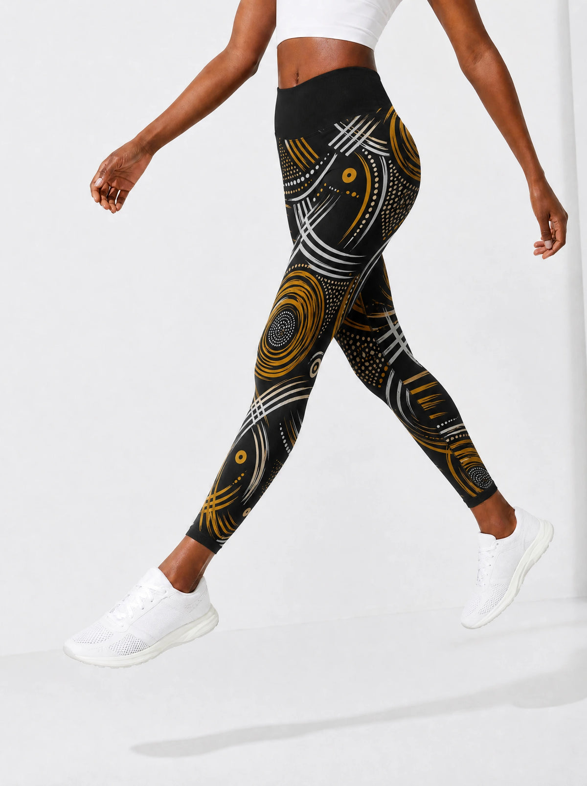 "Mzunguko" Leggings — side view on model, walking