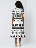 "Nakshi" Sweetheart Midi Dress — back view on model