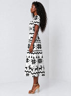 "Nakshi" Sweetheart Midi Dress — side view on model