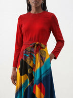 "Nala" Long Sleeve Midaxi Dress — close-up of the tie sash and the in-seam side pocket