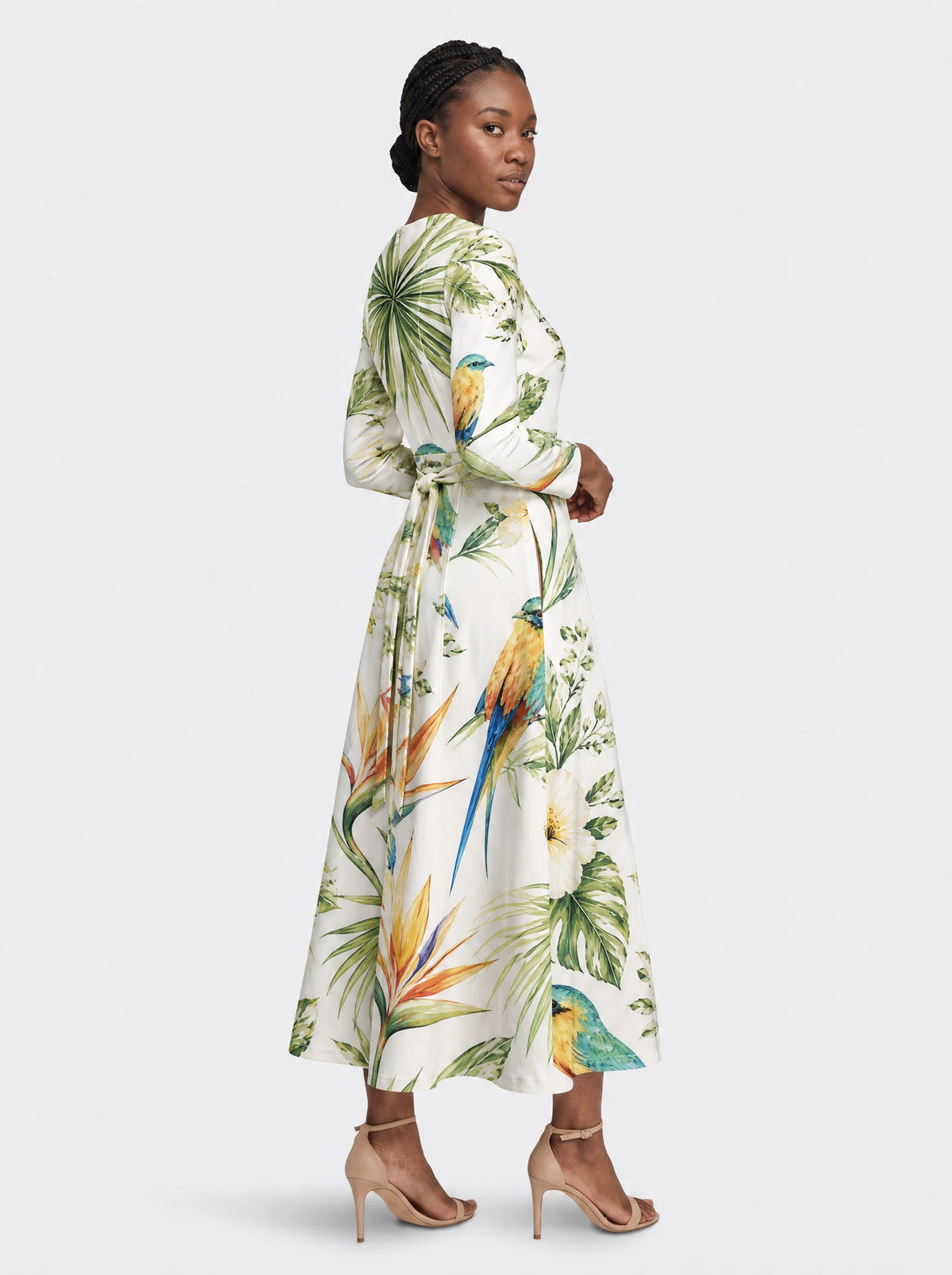 "Ndege" Long Sleeve Midaxi Dress — three-quarter view on model, hand in the side pocket