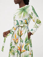"Ndege" Long Sleeve Midaxi Dress — close-up of the tie sash and the in-seam side pocket