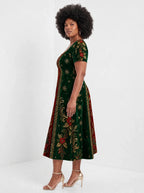 "Nderemo" Sweetheart Midi Dress — side view on model