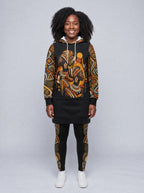 "Ndugu" Hoodie Dress — front view on model, styled with the matching leggings