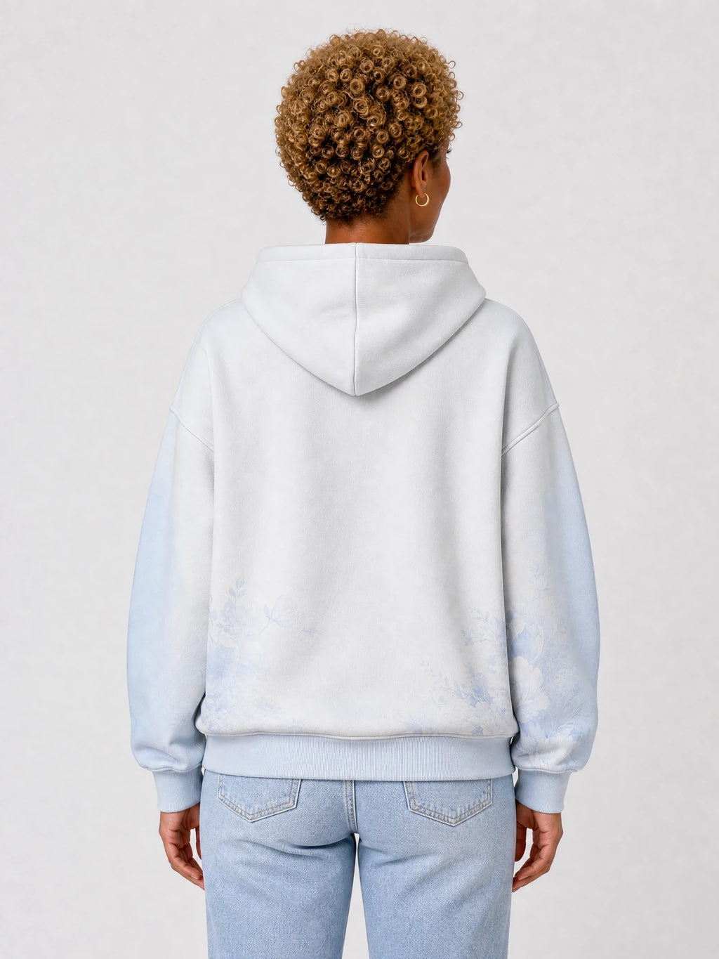 "Neema" Hoodie — back view on model