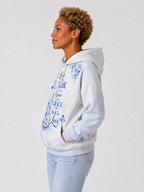"Neema" Hoodie — side view on model