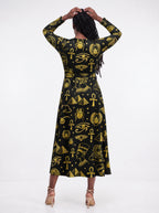 "Nefertiti Black Gold" Long Sleeve Midaxi Dress — back view on model
