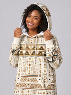 "Ngano" Hoodie Dress — close-up on model, hood up, styled with the matching leggings