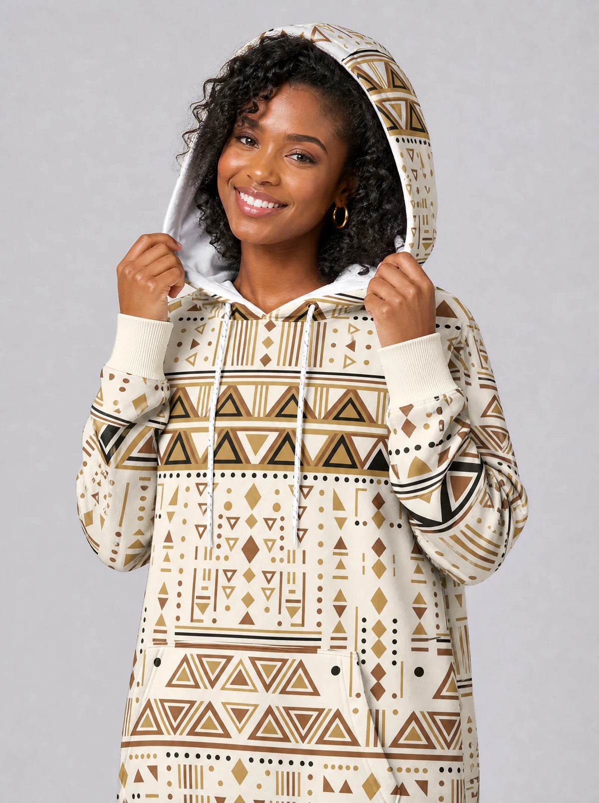 "Ngano" Hoodie Dress — close-up on model, hood up, styled with the matching leggings