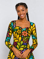 "Njano" Long Sleeve Sweetheart Midi Dress — print close-up on model