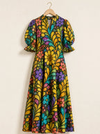 "Njano" Puff Sleeve Dress — the dress on a hanger, front